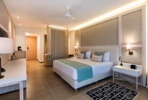 Postel nebo postele na pokoji v ubytování Hotel Irotama Lago
