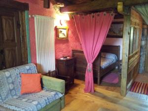 A bed or beds in a room at Affittacamere Saint Salod