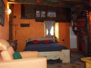 A bed or beds in a room at Affittacamere Saint Salod