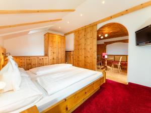 Postel nebo postele na pokoji v ubytování Hotel Alaska