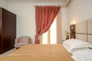 Posteľ alebo postele v izbe v ubytovaní Aeolis Boutique Hotel