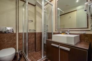 Kúpeľňa v ubytovaní Aeolis Boutique Hotel
