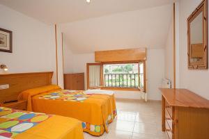 Posteľ alebo postele v izbe v ubytovaní Hostal Vinuesa