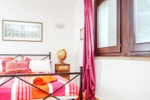 Posteľ alebo postele v izbe v ubytovaní Relax tra terra e mare