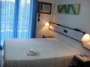 Łóżko lub łóżka w pokoju w obiekcie Hotel Kloppel