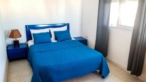 Postel nebo postele na pokoji v ubytování Mahdia Place Apartments