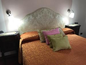 A bed or beds in a room at Il Fiordaliso