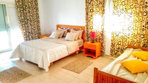 Postel nebo postele na pokoji v ubytování Mahdia Place Apartments