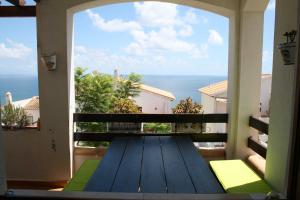 a balcony with a view of the ocean at Bungalow Mediterraneo in Santa Pola