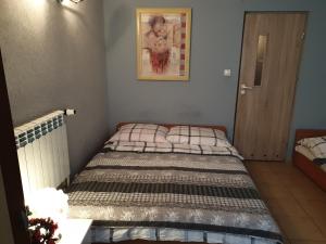 Postel nebo postele na pokoji v ubytování Agroturystyka