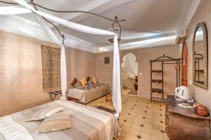 Riad Janoub客房内的一张或多张床位