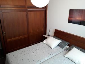 מיטה או מיטות בחדר ב-Sol Bolero