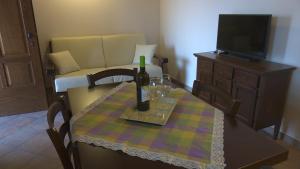 TV a/nebo společenská místnost v ubytování Residence Colle Veroni