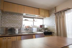 Kuchyň nebo kuchyňský kout v ubytování Matsuyama - House / Vacation STAY 57590