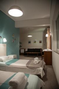 Postel nebo postele na pokoji v ubytování Hotel Liberty