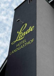 a sign on the side of a building at Hotel Landgasthof Linde in Nürtingen