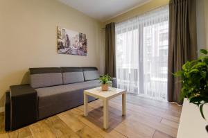 Posedenie v ubytovaní Krakowiak Apartments