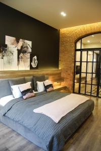 Postel nebo postele na pokoji v ubytování Apart Hotel на Трояндовой