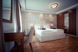 Posteľ alebo postele v izbe v ubytovaní Grand Lakes 2