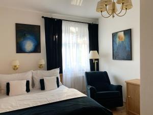 Voodi või voodid majutusasutuse Antik Hotel Sofia toas
