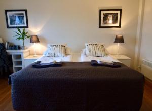 Letto o letti in una camera di Guesthouse Carina