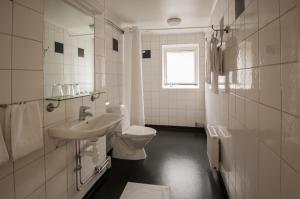 
Ett badrum på Slottshotellet Budget Accommodation
