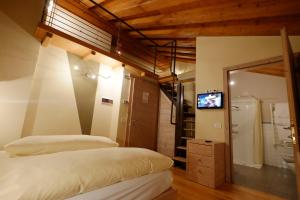Postel nebo postele na pokoji v ubytování Chalet C'Est La Vie