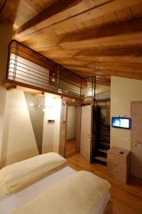 Postel nebo postele na pokoji v ubytování Chalet C'Est La Vie