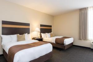 Tempat tidur dalam kamar di The Brunswick Hotel