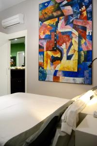 A bed or beds in a room at Atmosfere Puniche b&b