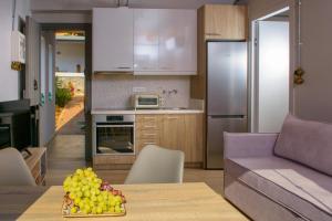 A kitchen or kitchenette at Villa Douloumi