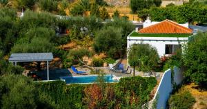 The swimming pool at or close to Villa Douloumi