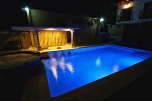 Bazén v ubytování Hotel Concierge Flor y Canto nebo v jeho okolí