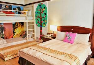 Voodi või voodid majutusasutuse Yoho Beach Resort Kenting toas