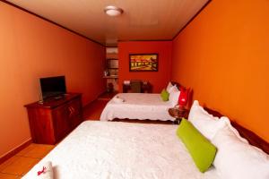 Cama o camas de una habitación en Hotel Mar y Mar