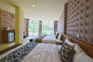 Letto o letti in una camera di Kenting 213 Homestay
