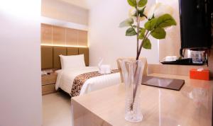 Katil atau katil-katil dalam bilik di Hotel Daily Inn