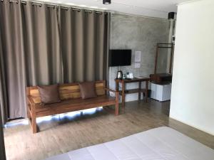 TV a/nebo společenská místnost v ubytování Sangkaset Resort