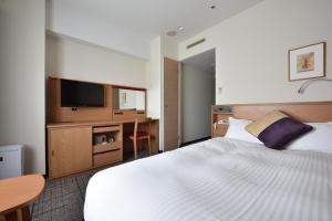 Letto o letti in una camera di Hotel Granvia Hiroshima