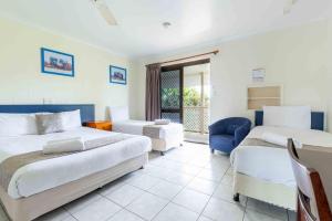 Postel nebo postele na pokoji v ubytování Motel Ingham