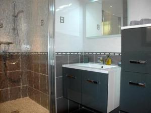 a bathroom with a shower and a sink at Roc A Mare in Galeria +62 photos