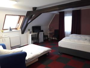 Postel nebo postele na pokoji v ubytování Hotel Luca