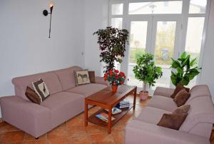 Ruang duduk di Ferienwohnungen im Ostseebad Goehr