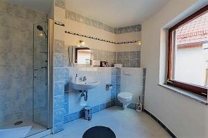 Koupelna v ubytování Hotel Luca
