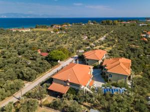 an aerial view of a house with orange roofs at Filippos Hotel in Skala Rachoniou