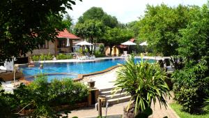 Bazén v ubytování PS Thana Resort nebo v jeho okolí