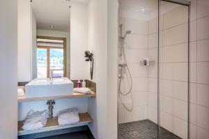 Vannituba majutusasutuses Almdorf Almlust