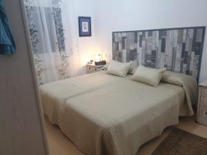 Una cama o camas en una habitación de Villa Carmen 21 fotos más