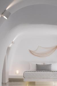 Katil atau katil-katil dalam bilik di White Concept Caves
