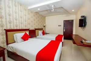 Postel nebo postele na pokoji v ubytování Hotel President